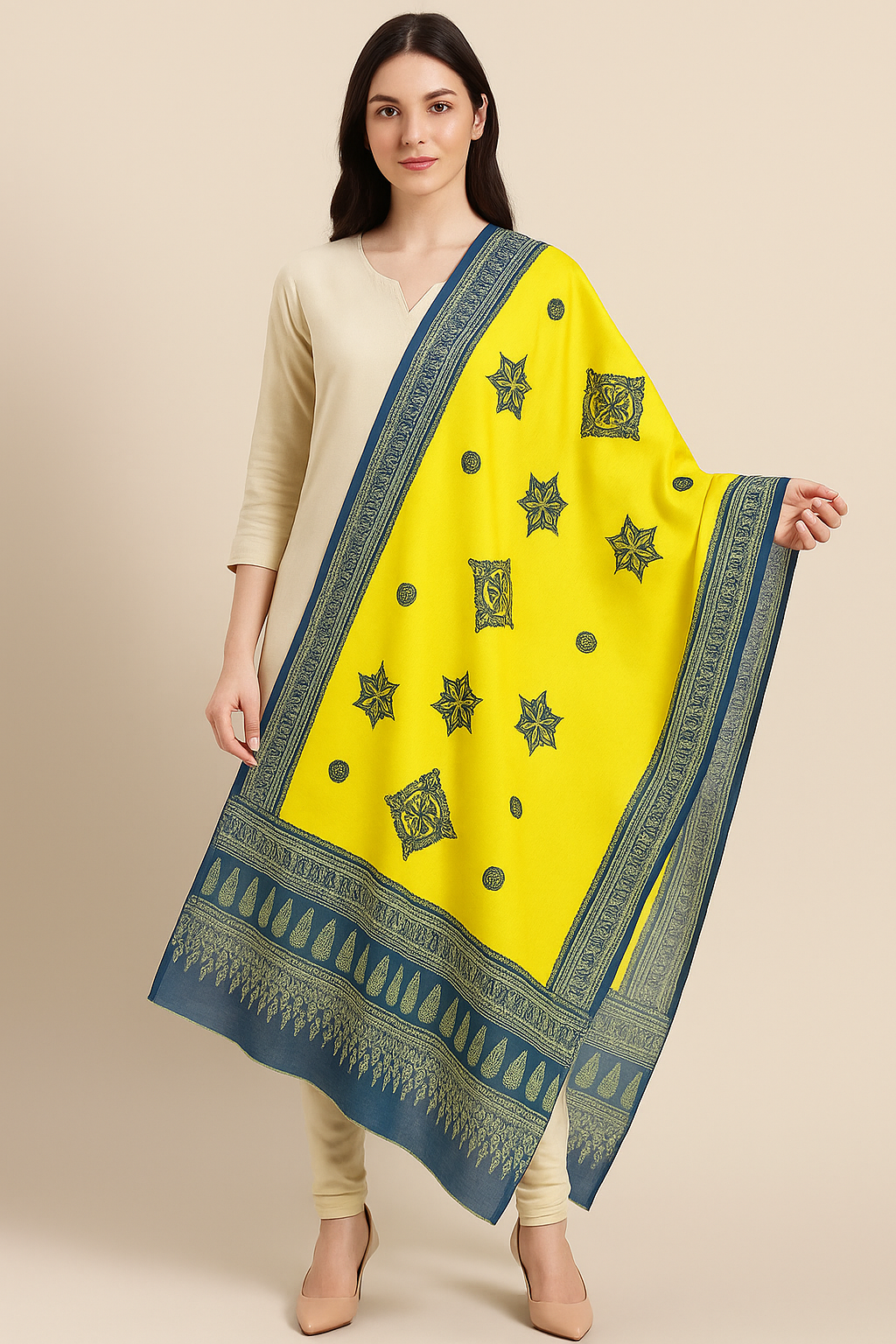 Woman wearing a yellow dupatta with applique green patterns