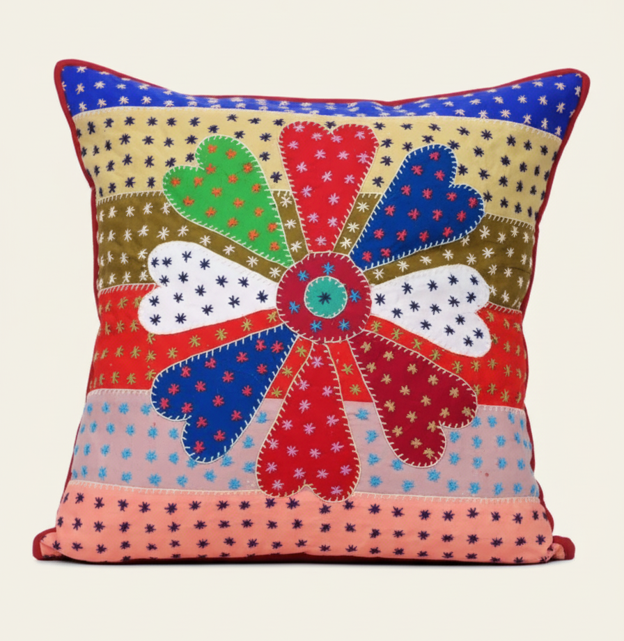 Decorative cushion with colorful patchwork design