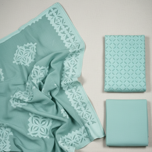 Set of blue applique fabric set with patterns on a light gray background