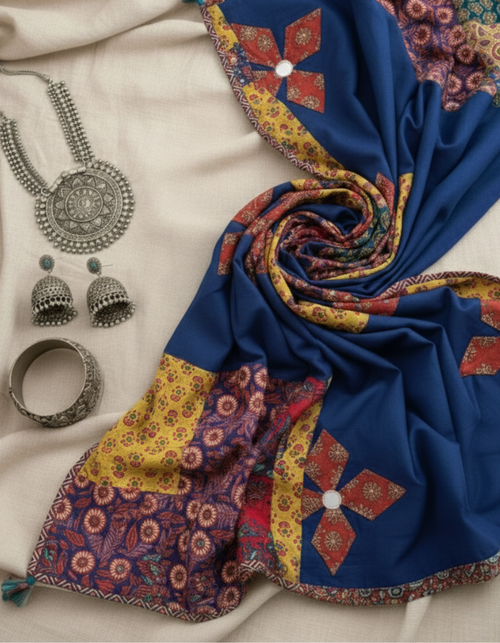 blue patchwork dupatta with jewelry on a light background