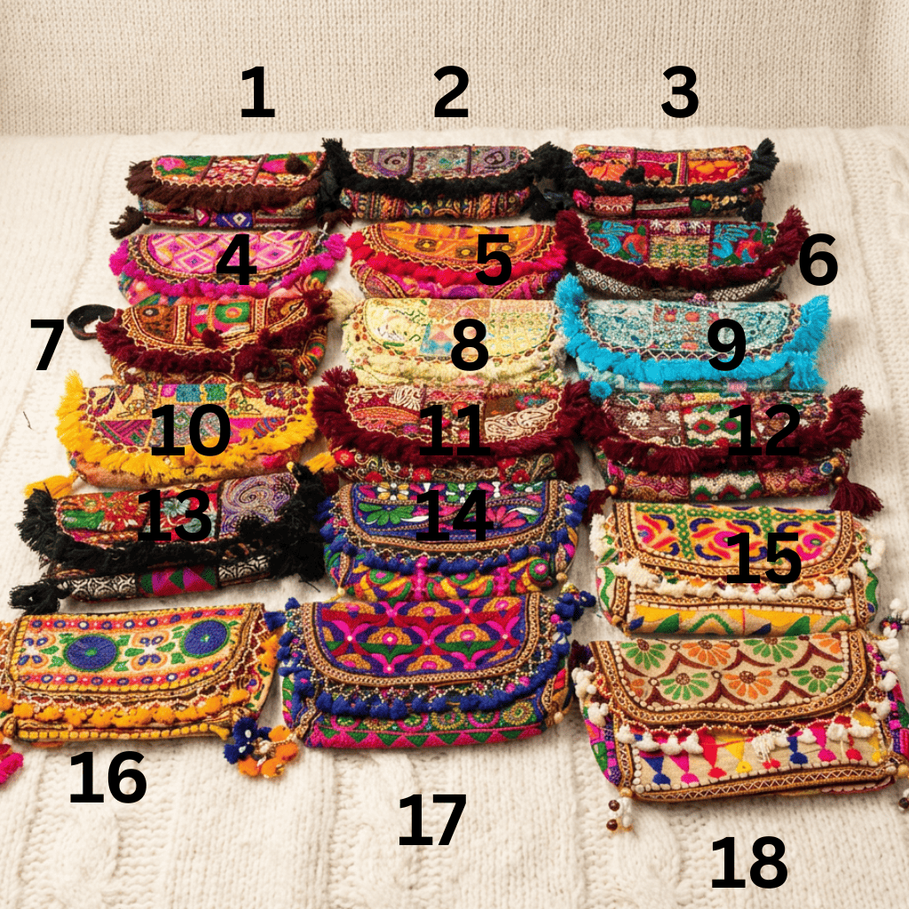 Collection of colorful embroidered bags with numbers on a light background