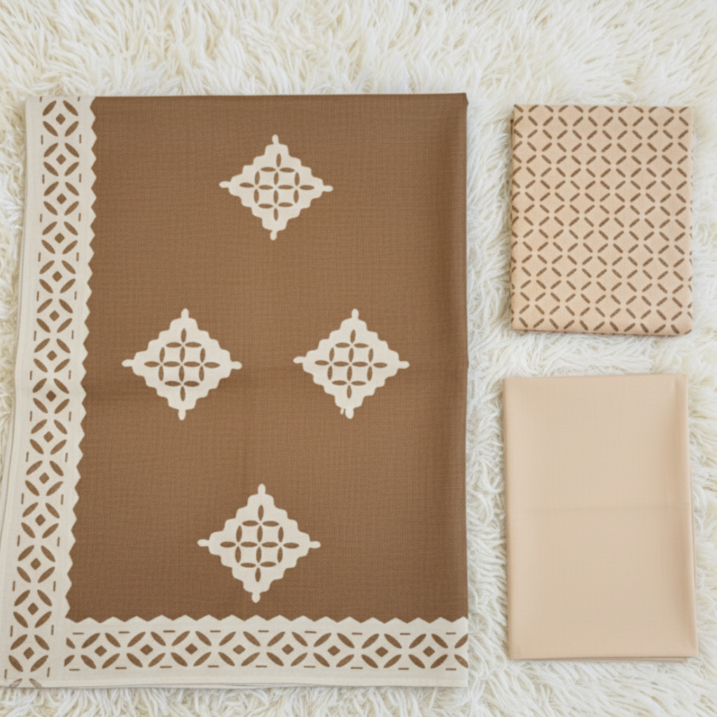 Brown applique suit set with geometric patterns on a textured surface