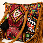 close up of Colorful Embroidered Boho Bag with Shell Detailing