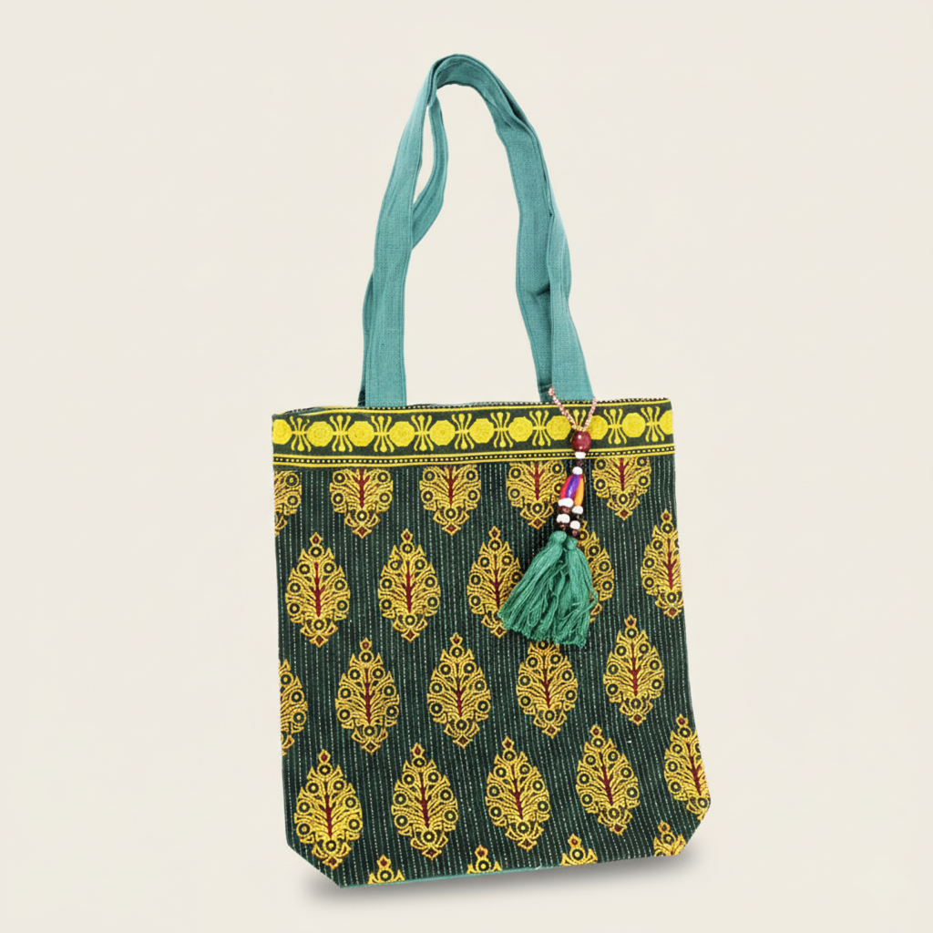 Tote bag with green and yellow pattern on a beige background