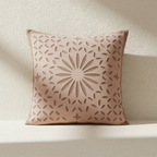 Decorativebeige cushion cover with a floral pattern on a neutral background