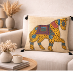 animal applique cushion cover on a sofa in a room setting