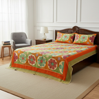 Decorative bedsheet with colorful patchwork design on a beige background