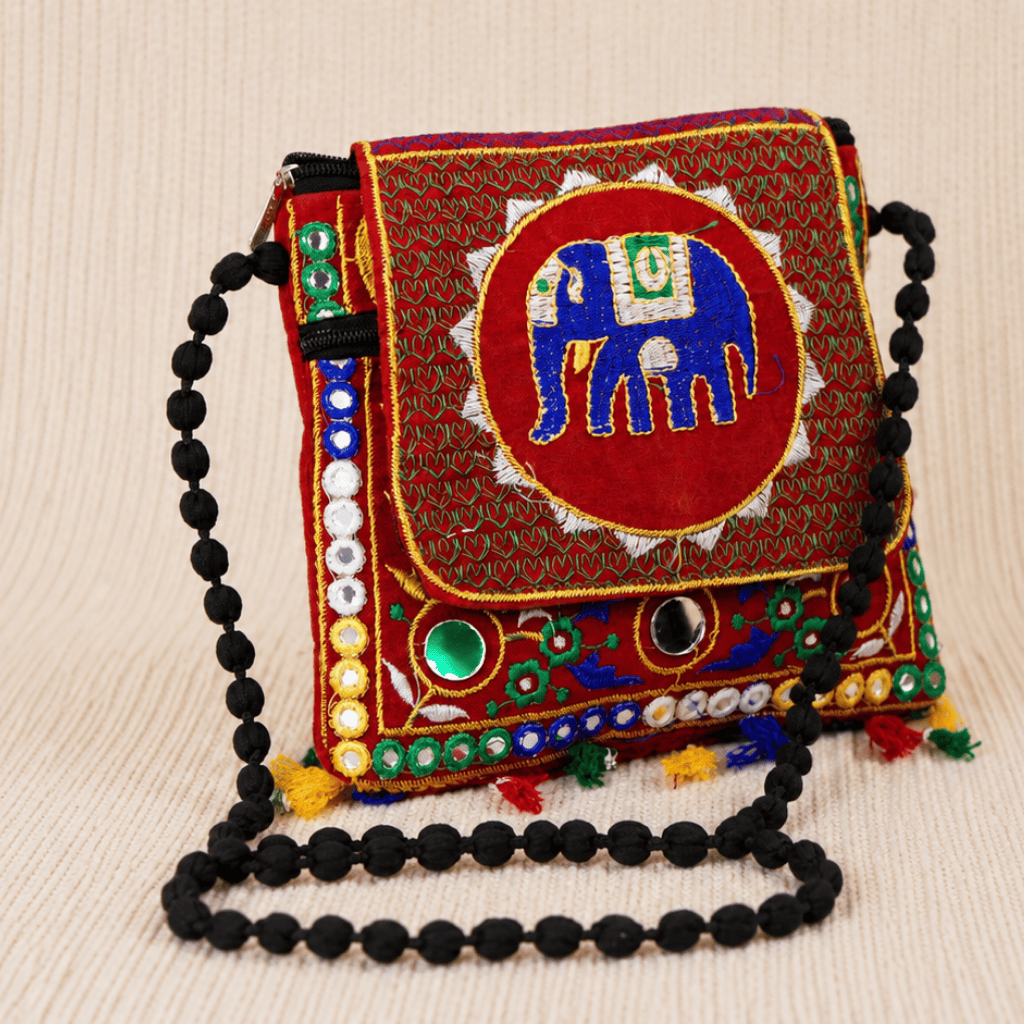colorful red embroidered elephant sling bag