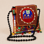 colorful red embroidered elephant sling bag