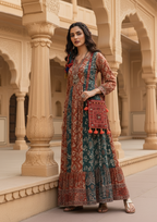 Woman in a traditional outfit with an embroidered sling bag