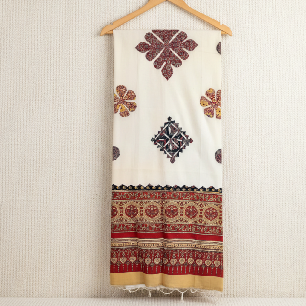 white ajrakh patchwork dupatta on a hanger