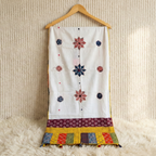 floral applique work dupatta on a hanger on a beige backgroud