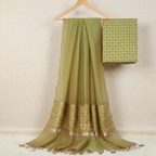 Green fabrics  on a beige background