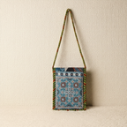 Small bag with a colorful pattern on a beige background