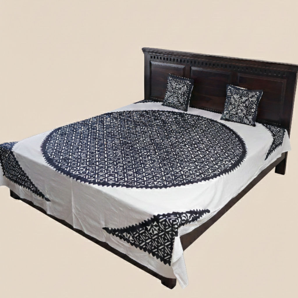 Bed with blue and white patterned bedding on a beige background