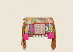 Colorful embroidered bag with tassels on a beige background