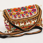 a white Nomad Banjara Embroidered Sling Purse