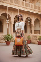 Woman holding an orange bag 