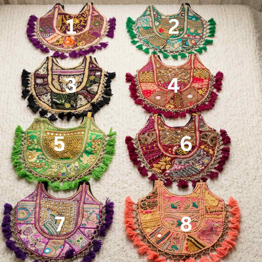 Eight colorful embroidered bags on a light background