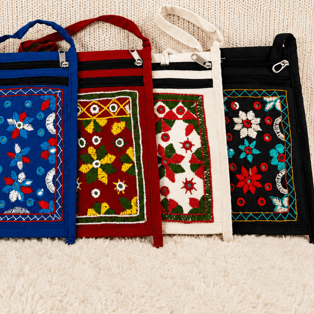 Small Embroidered Mobile Sling Bag in blue, red, white and black colors