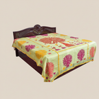 Bed with an applique green bedspread on a beige background