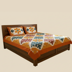 Bed with floral patterned bedding and wooden headboard on a beige background