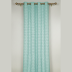 Patterned teal curtain on a gray background