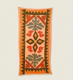 Decorative table runner with floral pattern s on a beige background