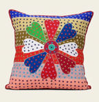 Decorative cushion with colorful patchwork design 